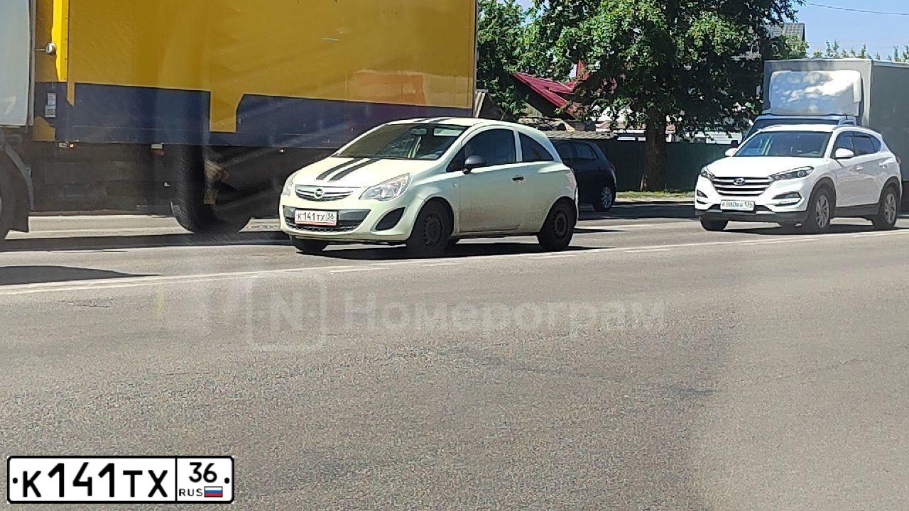 Фото автомобиля OPEL CORSA, 2011 — госномер К141ТХ36. Цвет: БЕЛЫЙ