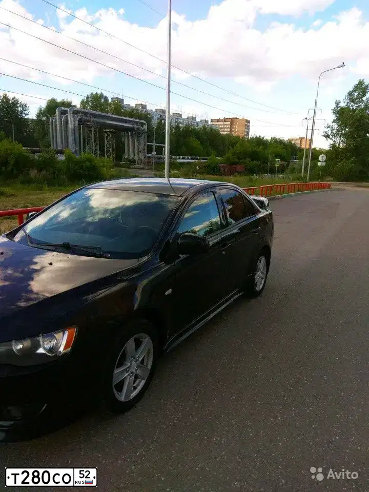 Фото автомобиля MITSUBISHI LANCER, 2007 — госномер Т280СО52. Цвет: ЧЕРНЫЙ
