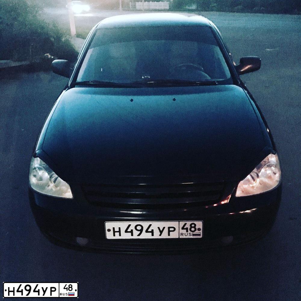 Фото автомобиля LADA 2172 PRIORA, 2009 — госномер Т397МН136. Цвет: Сине-Черный