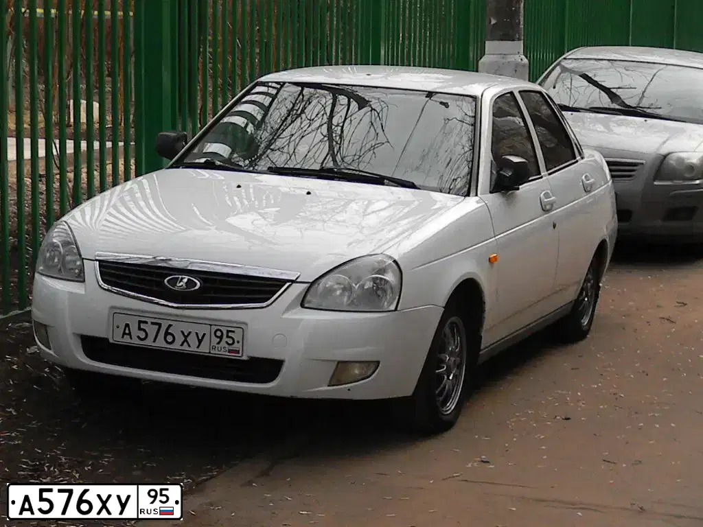 Фото автомобиля LADA PRIORA, 2011 — госномер Е655ВО323. Цвет: Белый
