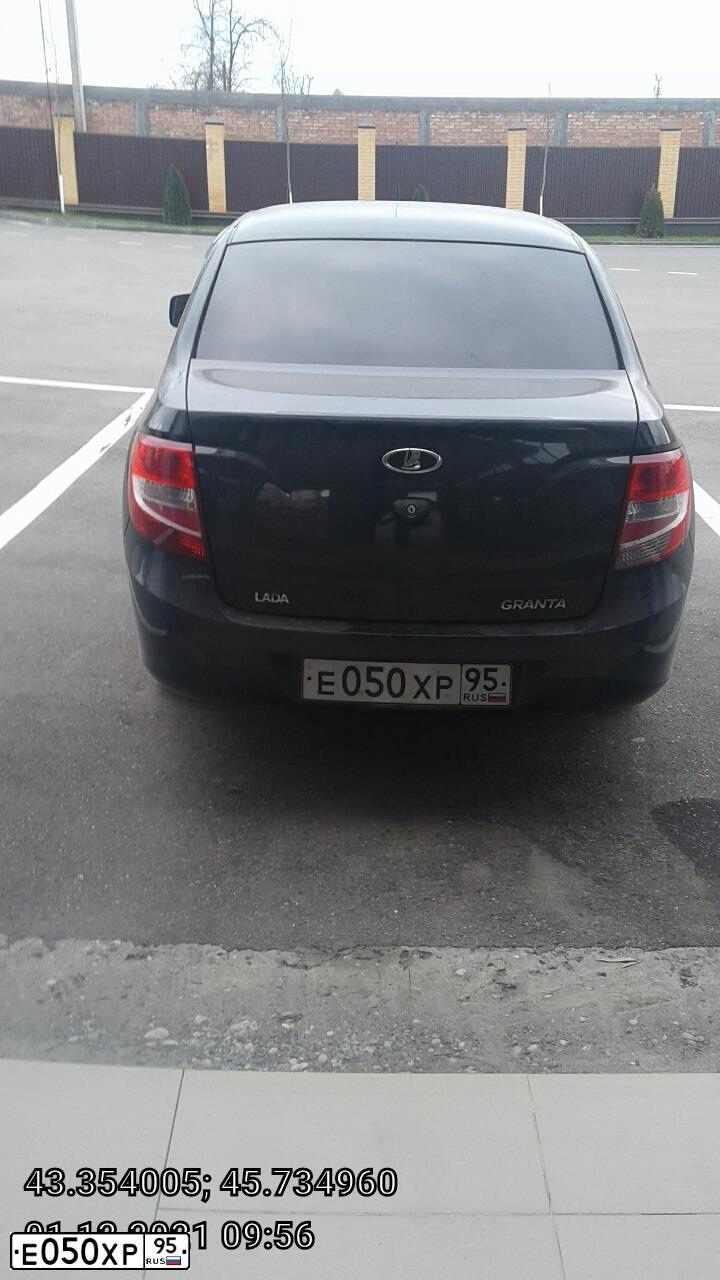 Фото автомобиля LADA 2190 GRANTA, 2014 — госномер Т810ЕО777. Цвет: ЧЕРНЫЙ