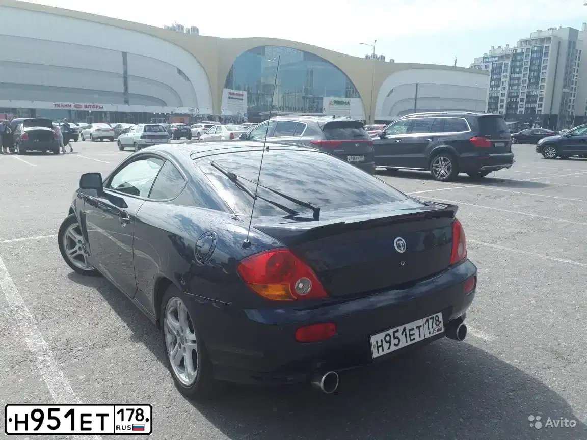 Фото автомобиля HYUNDAI TIBURON GТ, 2003 — госномер Е258ВХ76. Цвет: ТЕМНО-СИНИЙ
