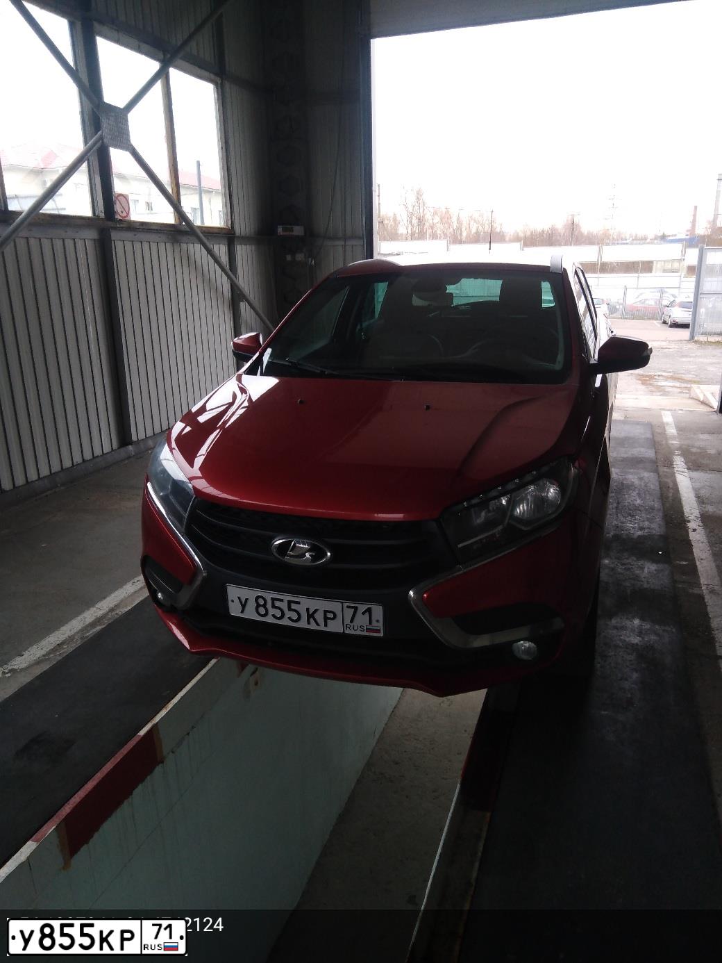 Фото автомобиля LADA XRAY, 2017 — госномер О214АВ799. Цвет: Красный