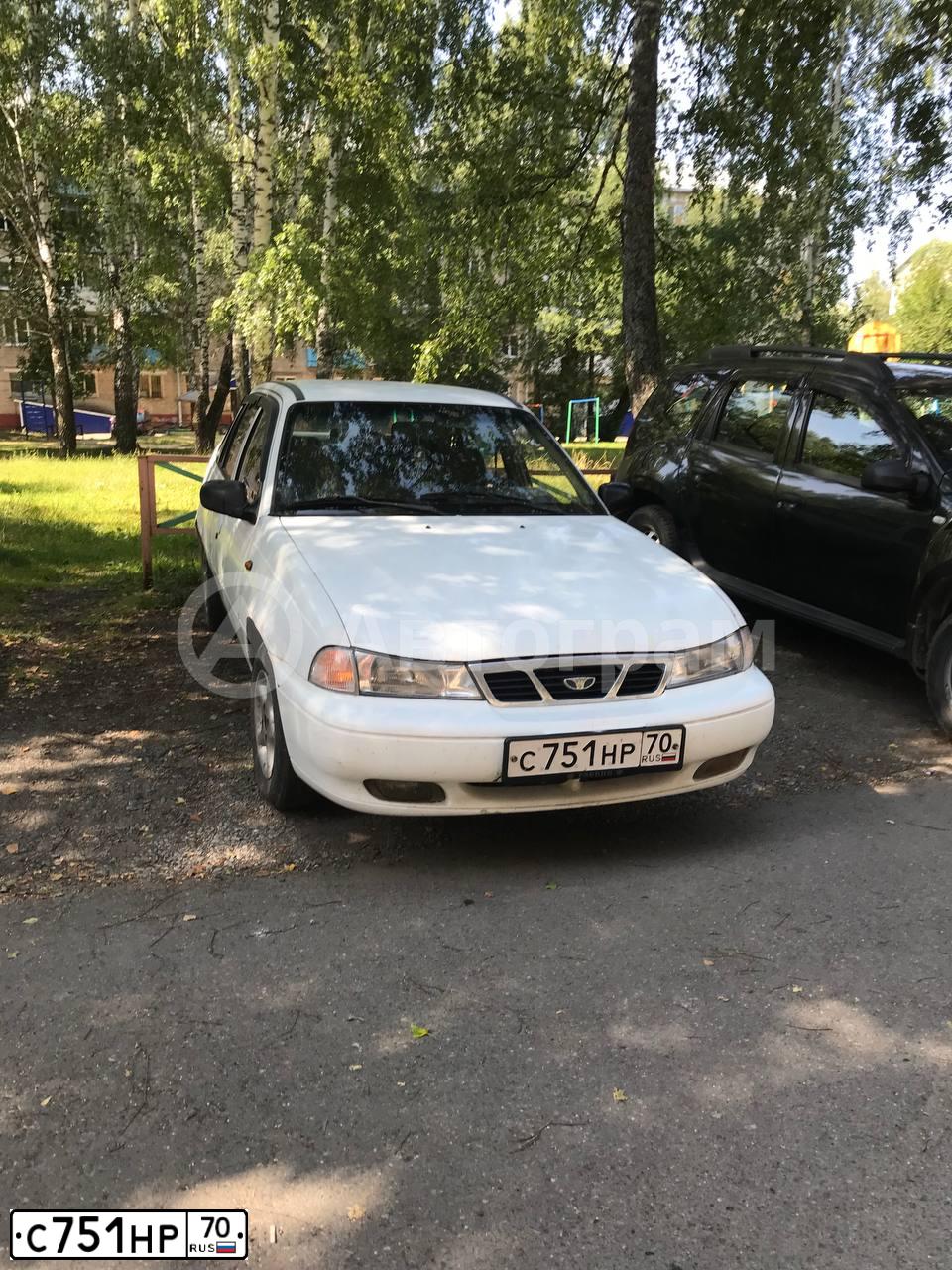 Фото автомобиля DAEWOO NEXIA, 1998 — госномер Н768ЕО70. Цвет: Белый