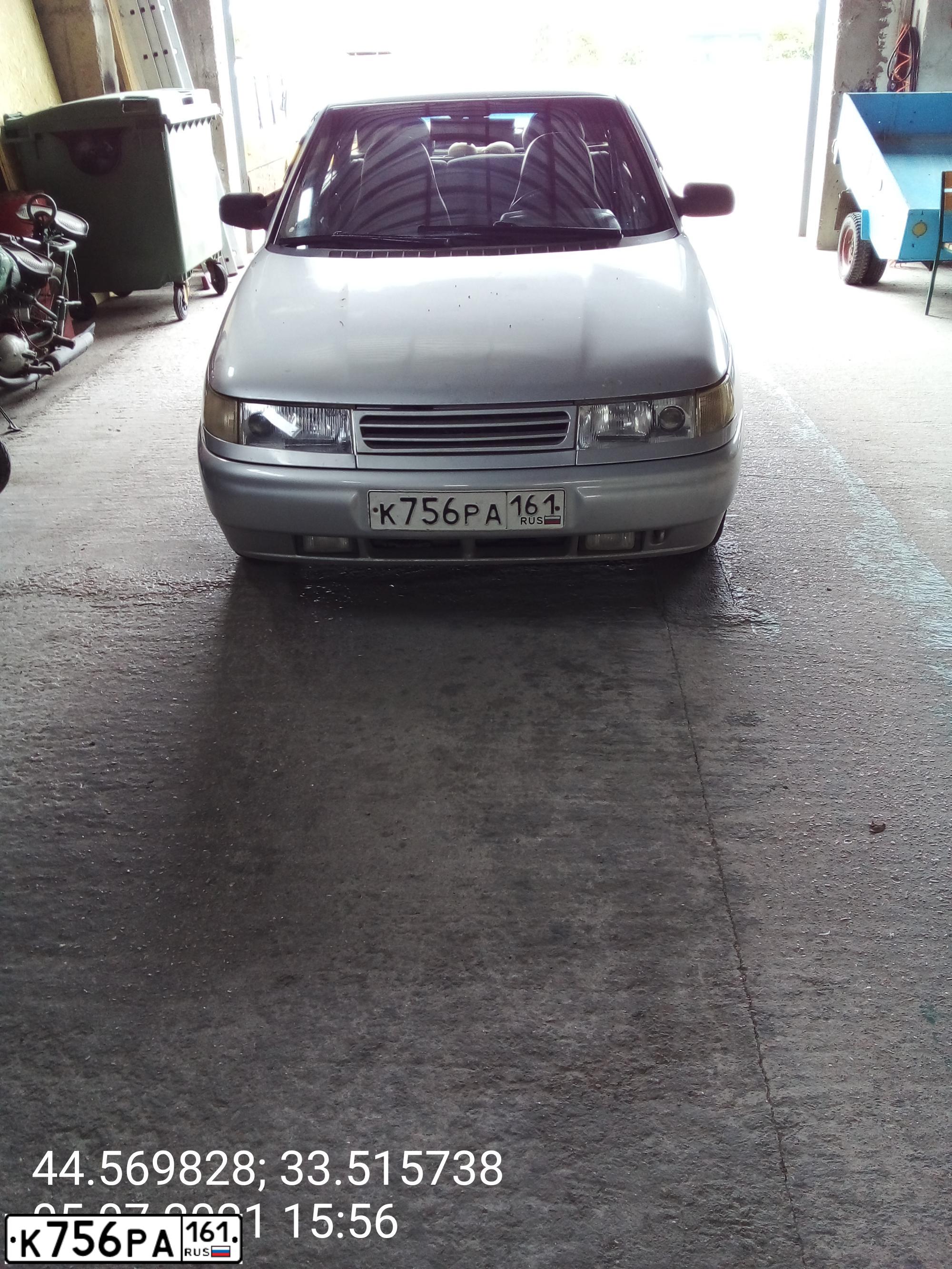 Фото автомобиля LADA 2112, 2002 — госномер К756РА161. Цвет: светло-серебристый металлик