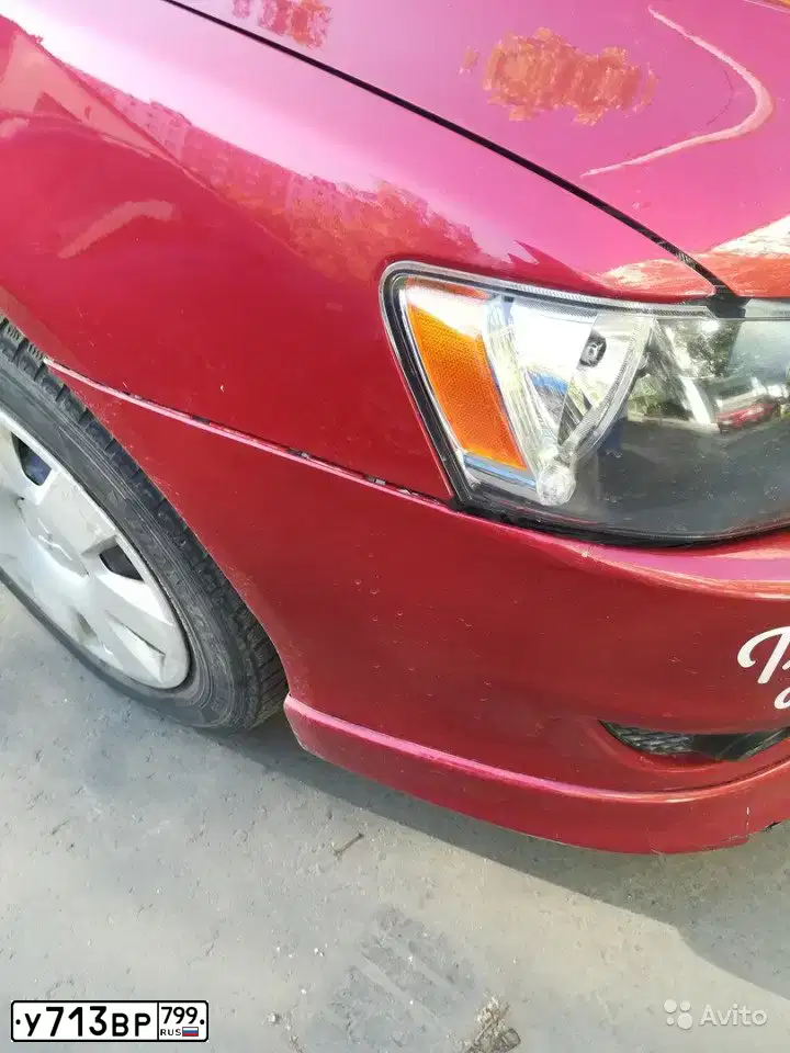 Фото автомобиля MITSUBISHI LANCER, 2007 — госномер Х155НУ150. Цвет: Красный