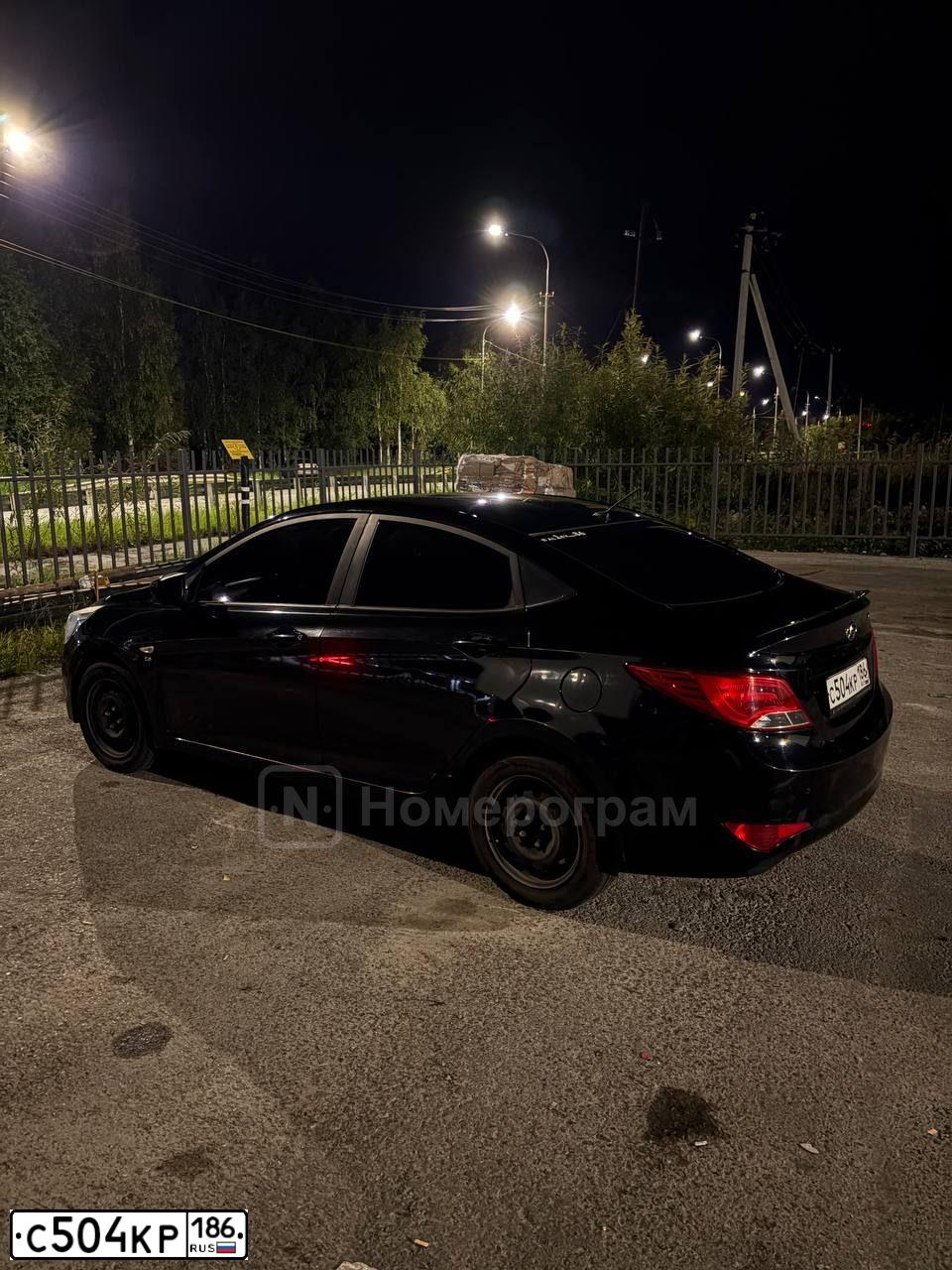 Фото автомобиля HYUNDAI SOLARIS, 2016 — госномер С504КР186. Цвет: ЧЕРНЫЙ