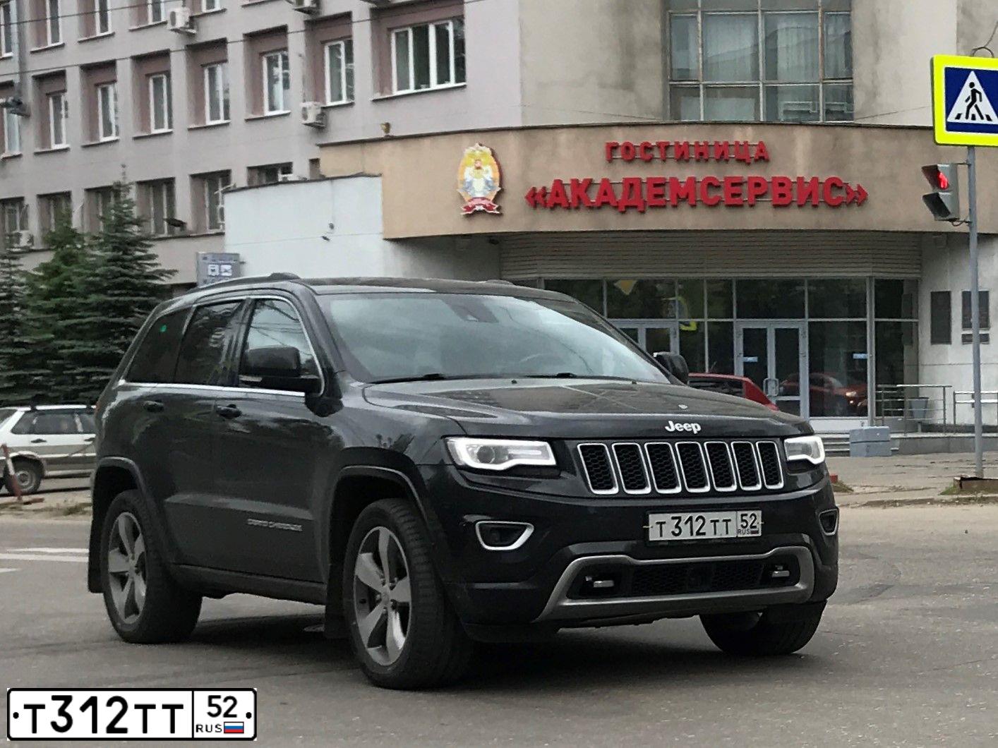 Фото автомобиля VOLKSWAGEN TIGUAN, 2011 — госномер Т312ТТ52. Цвет: ЧЕРНЫЙ
