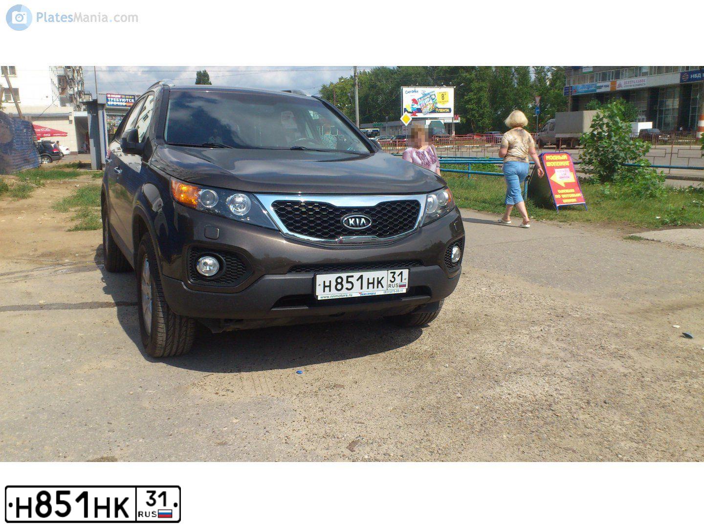 Фото автомобиля KIA SORENTO, 2010 — госномер Р007НТ31. Цвет: Коричневый