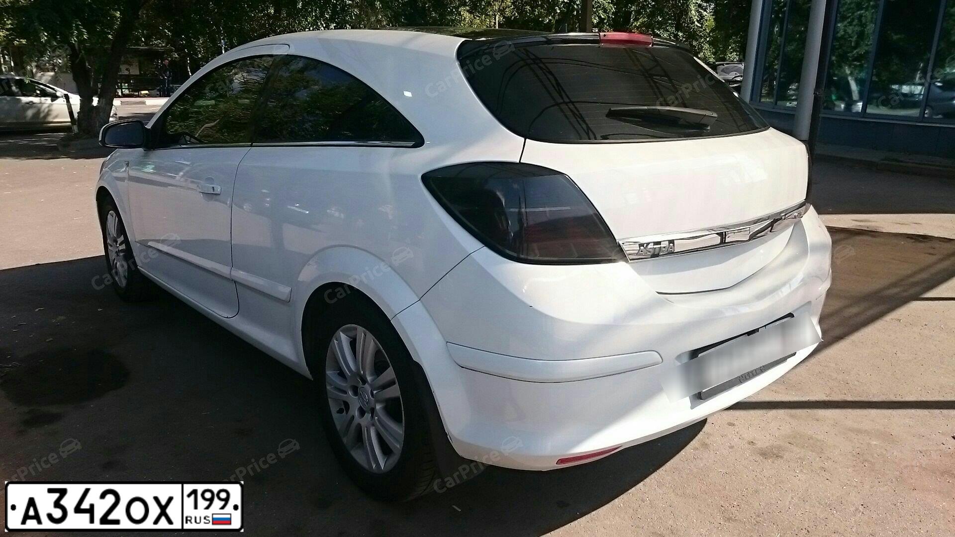 Фото автомобиля OPEL ASTRA, 2008 — госномер Р904СМ750. Цвет: Белый