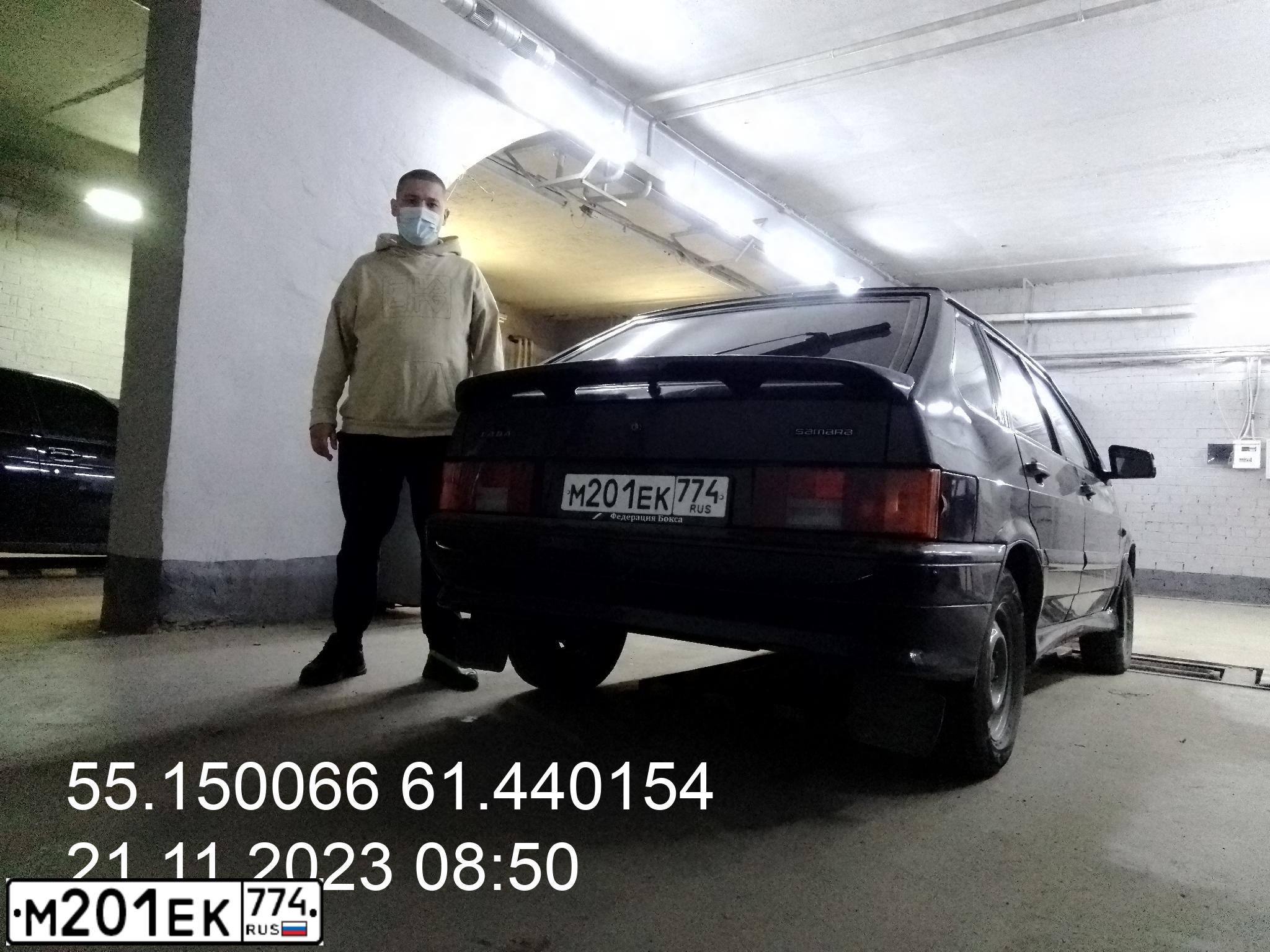 Фото автомобиля LADA 2114 SAMARA, 2010 — госномер М201ЕК774. Цвет: Сине-Черный
