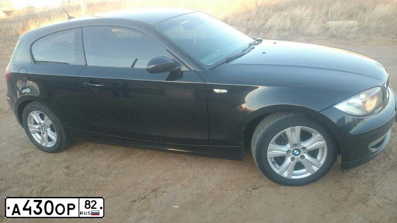 Фото автомобиля BMW SERIE 1, 2007 — госномер Е232МУ134. Цвет: ЧЕРНЫЙ
