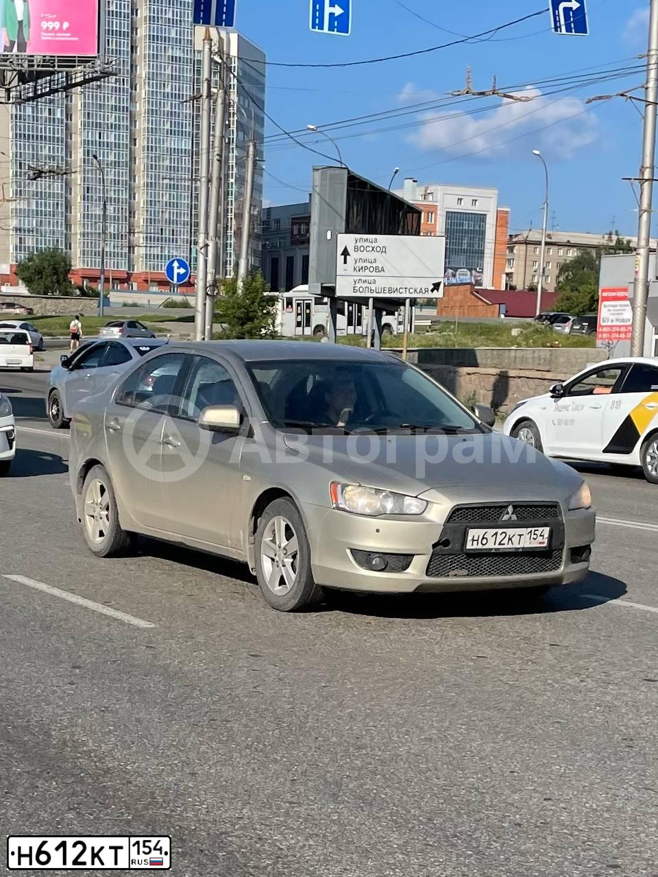 Фото автомобиля MITSUBISHI LANCER, 2008 — госномер Н612КТ154. Цвет: БЕЖЕВЫЙ