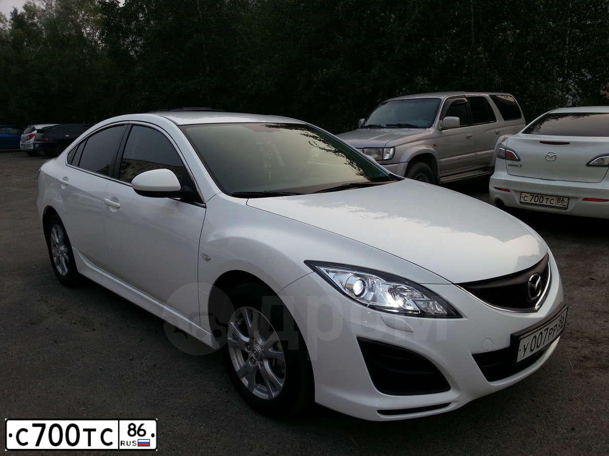 Фото автомобиля MAZDA 3, 2011 — госномер С700ТС86. Цвет: БЕЛЫЙ