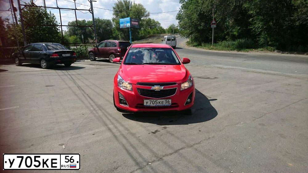 Фото автомобиля CHEVROLET CRUZE, 2013 — госномер А491ОК156. Цвет: Красный