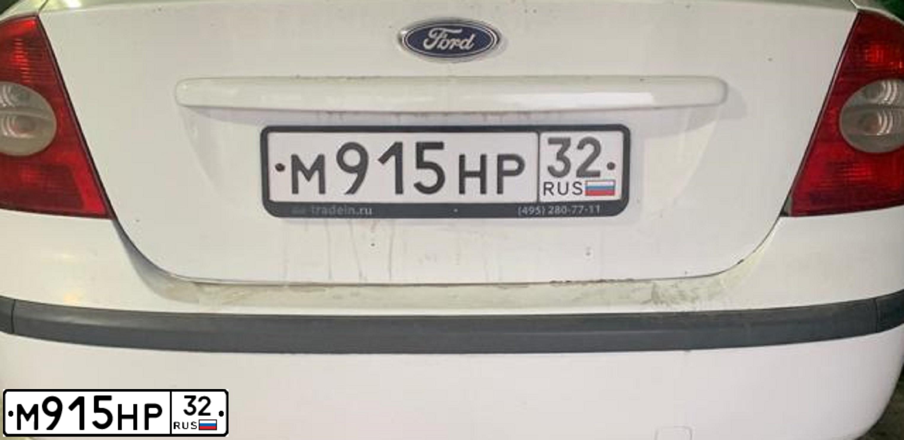 Фото автомобиля FORD FOCUS, 2005 — госномер Т944ВМ46. Цвет: Белый