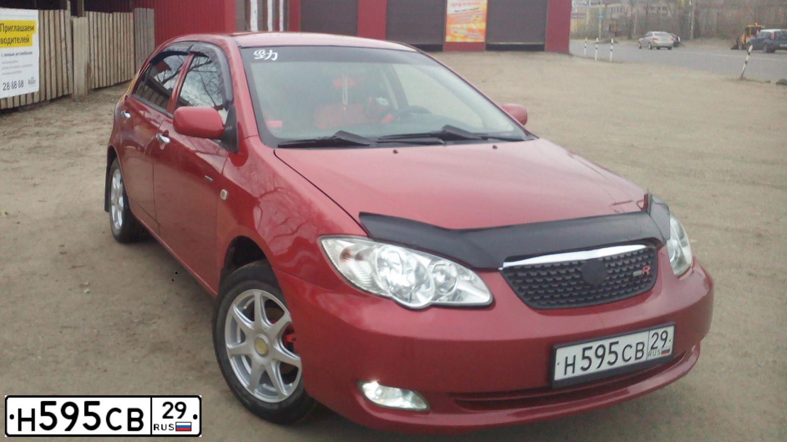 Фото автомобиля BYD F3, 2008 — госномер Н595СВ29. Цвет: КРАСНЫЙ