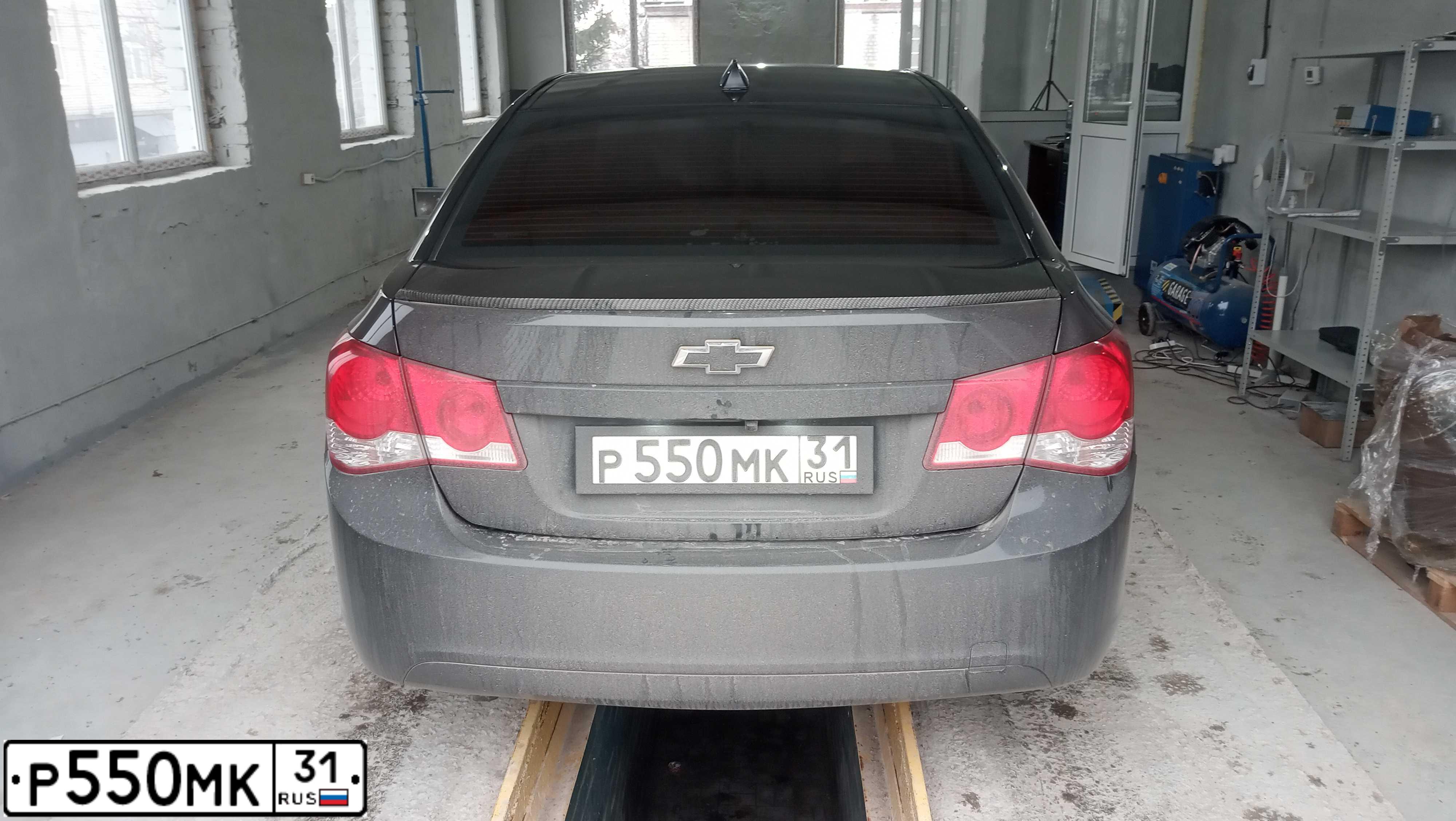 Фото автомобиля CHEVROLET CRUZE, 2010 — госномер Т900СВ31. Цвет: ЧЕРНЫЙ