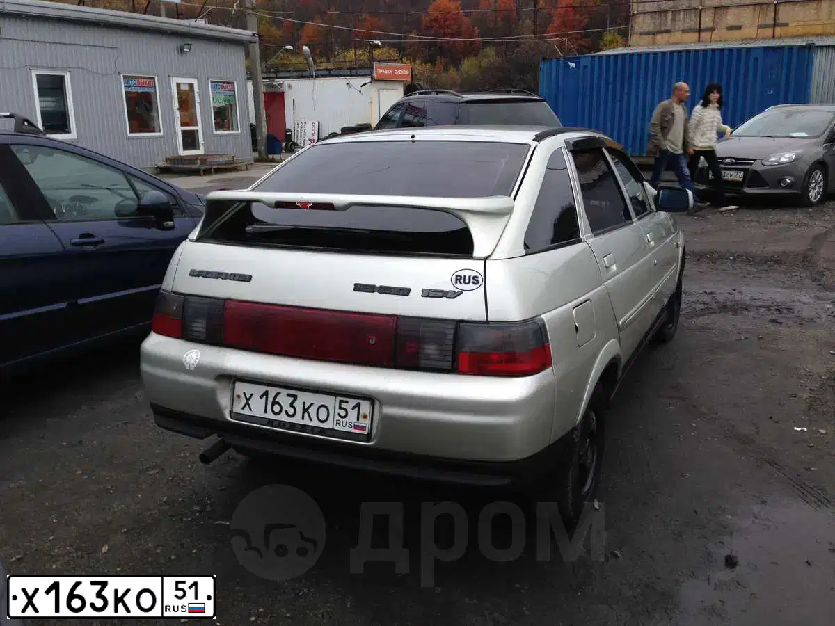 Фото автомобиля LADA 2112, 2004 — госномер Х163КО51. Цвет: ЧЕРНЫЙ