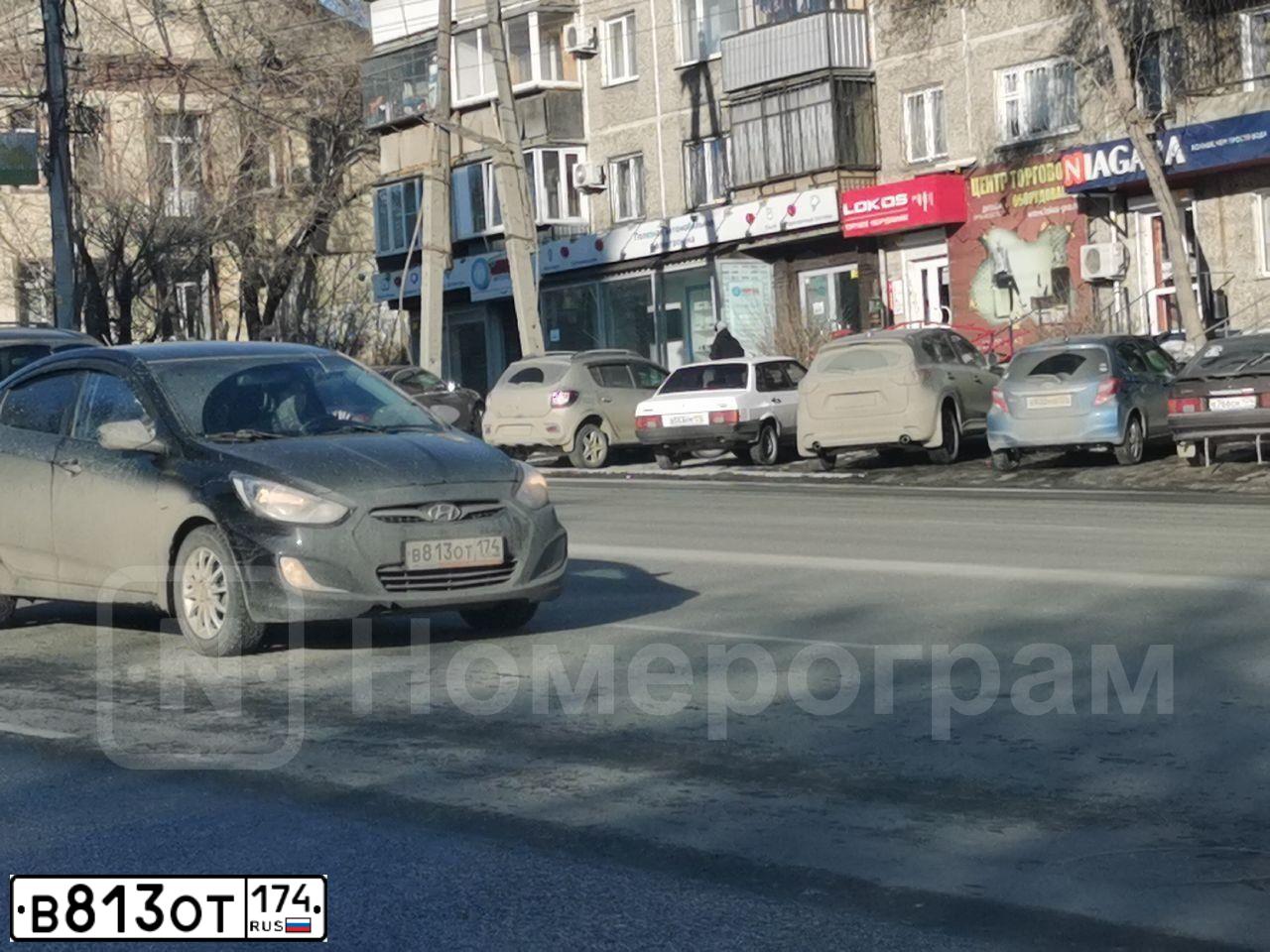Фото автомобиля HYUNDAI SOLARIS, 2012 — госномер В813ОТ174. Цвет: ЧЕРНЫЙ