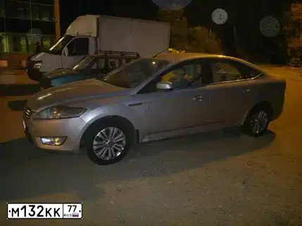 Фото автомобиля LADA 2112, 2002 — госномер М132КК77. Цвет: ЗЕЛЕНЫЙ ТЕМНЫЙ