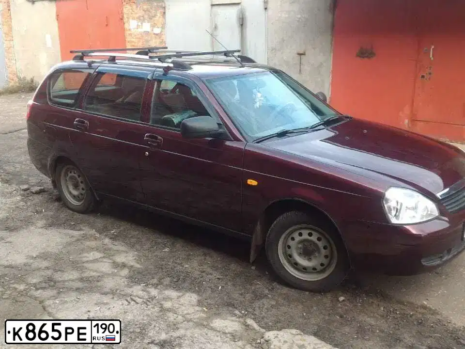 Фото автомобиля LADA 2171 PRIORA, 2011 — госномер О953АХ46. Цвет: ВИШНЕВЫЙ ТЕМНЫЙ