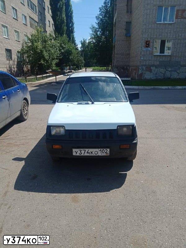 Фото автомобиля ВАЗ 111130-21, 2003 — госномер К333ЕР702. Цвет: Белый