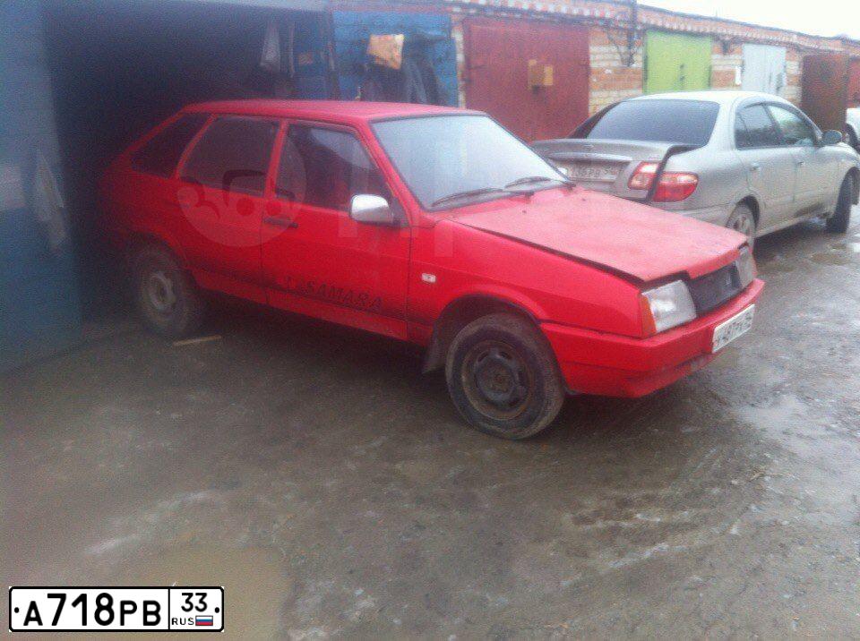 Фото автомобиля MITSUBISHI LANCER, 2004 — госномер А718РВ33. Цвет: СЕРЫЙ
