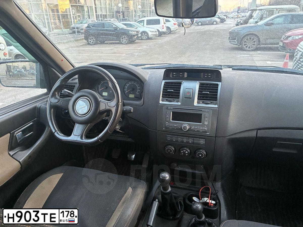 Фото автомобиля UAZ 3163 PATRIOT, 2012 — госномер Н903ТЕ178. Цвет: ЧЕРНЫЙ МЕТАЛЛИК