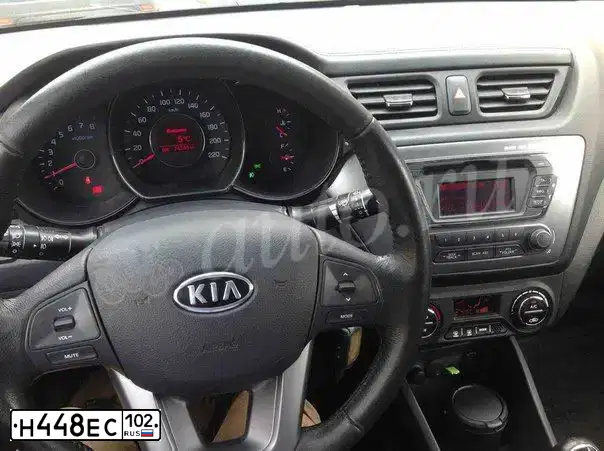 Фото автомобиля KIA RIO, 2012 — госномер А130ТК174. Цвет: СЕРЕБРИСТЫЙ
