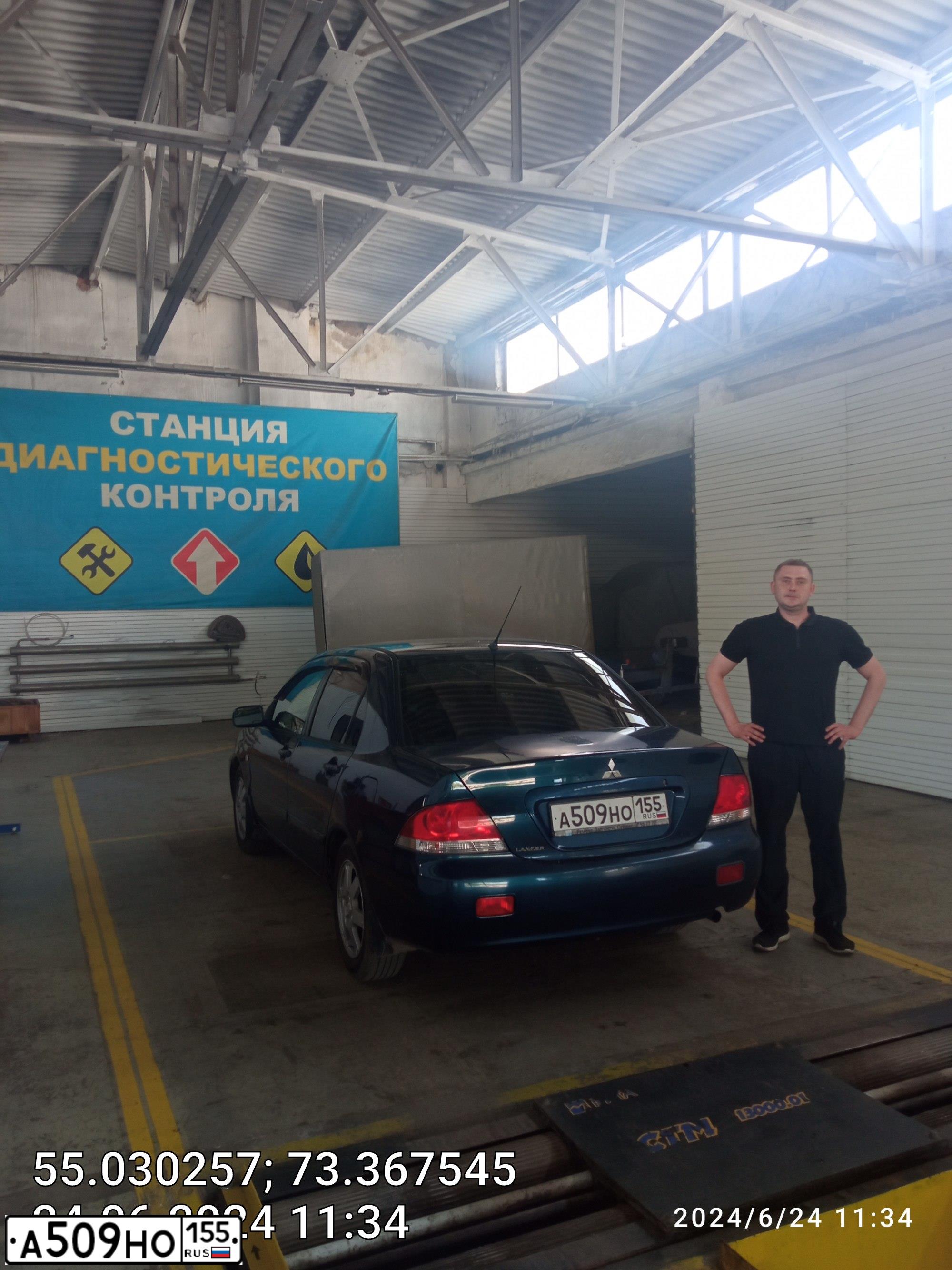 Фото автомобиля MITSUBISHI LANCER, 2006 — госномер А509НО155. Цвет: СИНИЙ