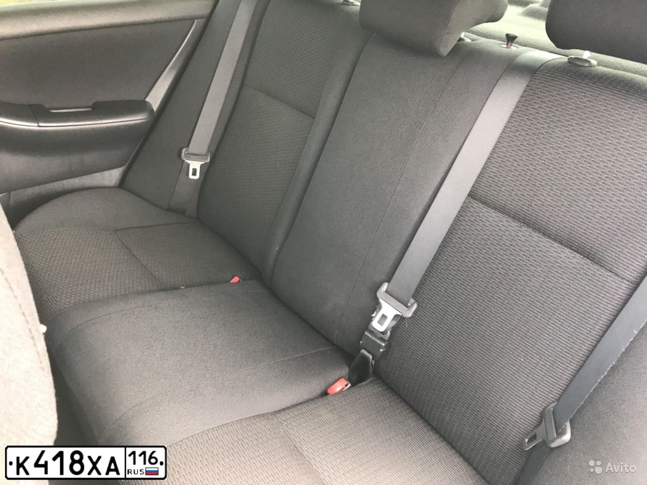 Фото автомобиля TOYOTA COROLLA, 2006 — госномер Н098ХТ174. Цвет: Серебристый