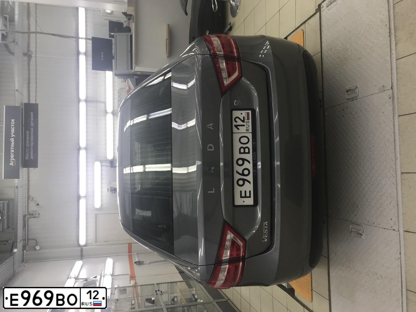 Фото автомобиля LADA VESTA, 2016 — госномер Е969ВО12. Цвет: Серый