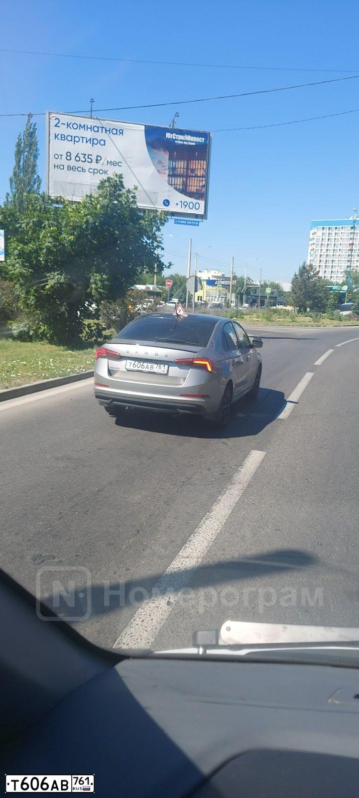 Фото автомобиля SKODA RAPID, 2021 — госномер С633ОУ761. Цвет: МНОГОЦВЕТНЫЙ