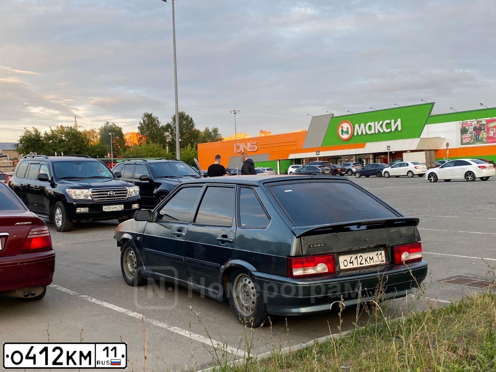 Фото автомобиля LADA 2114, 2009 — госномер Х151УТ43. Цвет: Серо-сине-зеленый