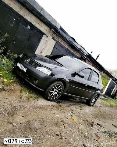 Фото автомобиля RENAULT T LOGAN, 2009 — госномер Т885ТР71. Цвет: ТЕМНО-СЕРЫЙ
