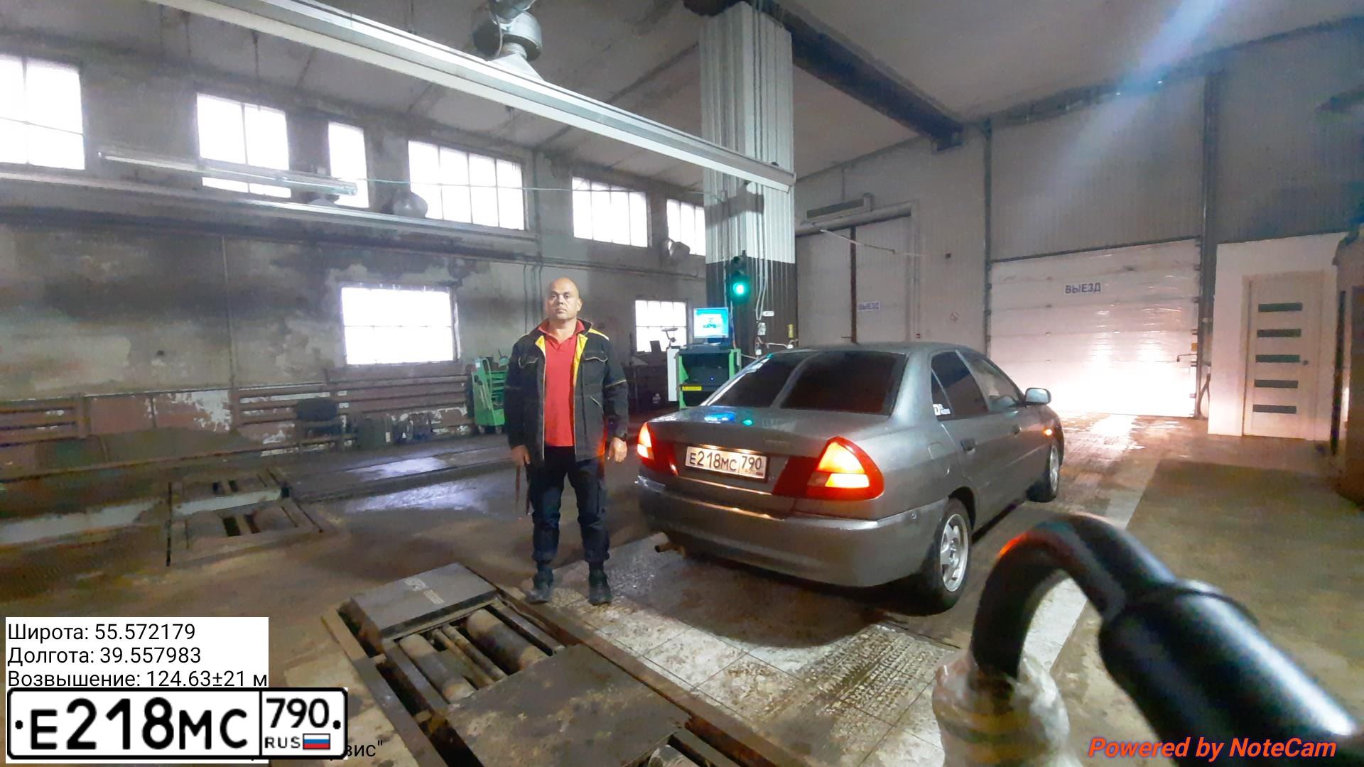 Фото автомобиля MITSUBISHI LANCER, 2000 — госномер К035НА67. Цвет: Серый