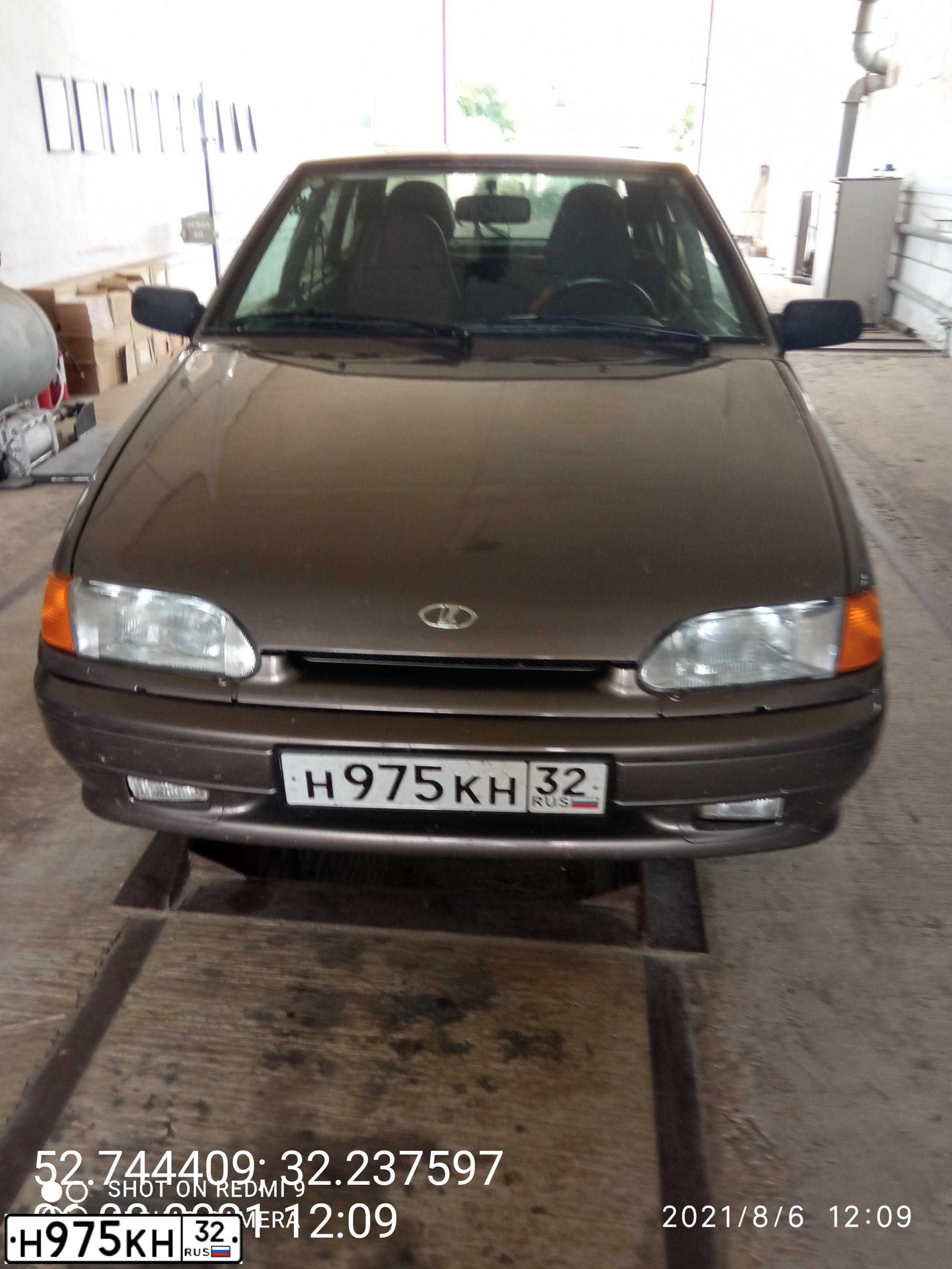 Фото автомобиля LADA 2114 SAMARA, 2013 — госномер Н230АС65. Цвет: Золотисто-коричневый
