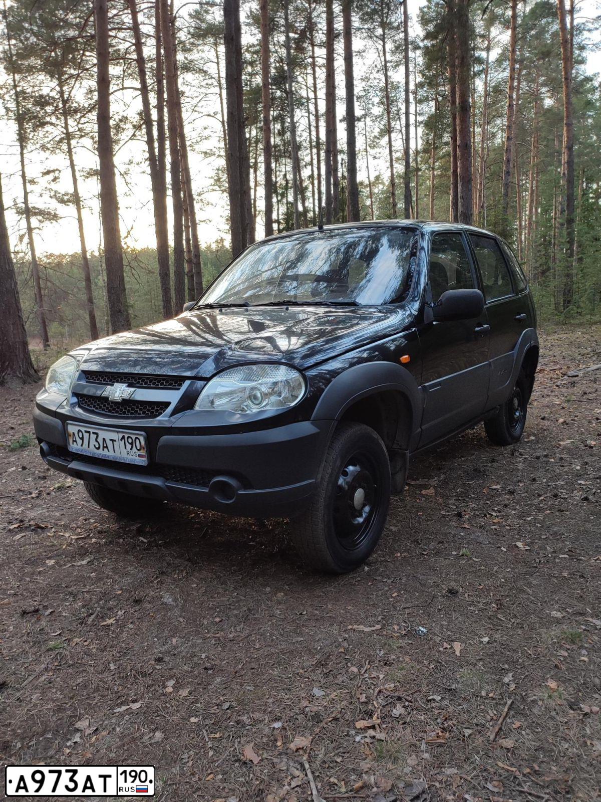 Фото автомобиля CHEVROLET NIVA, 2009 — госномер С780ХН73. Цвет: ЧЕРНЫЙ СИНИЙ