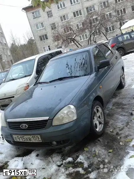 Фото автомобиля LADA 2172 PRIORA, 2011 — госномер Е915ХВ159. Цвет: СЕРО-СИНЕ-ЗЕЛЕНЫЙ