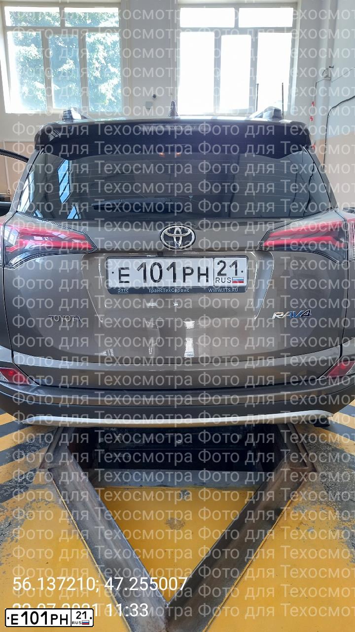 Фото автомобиля TOYOTA RAV4, 2016 — госномер Е101РН21. Цвет: БРОНЗОВЫЙ