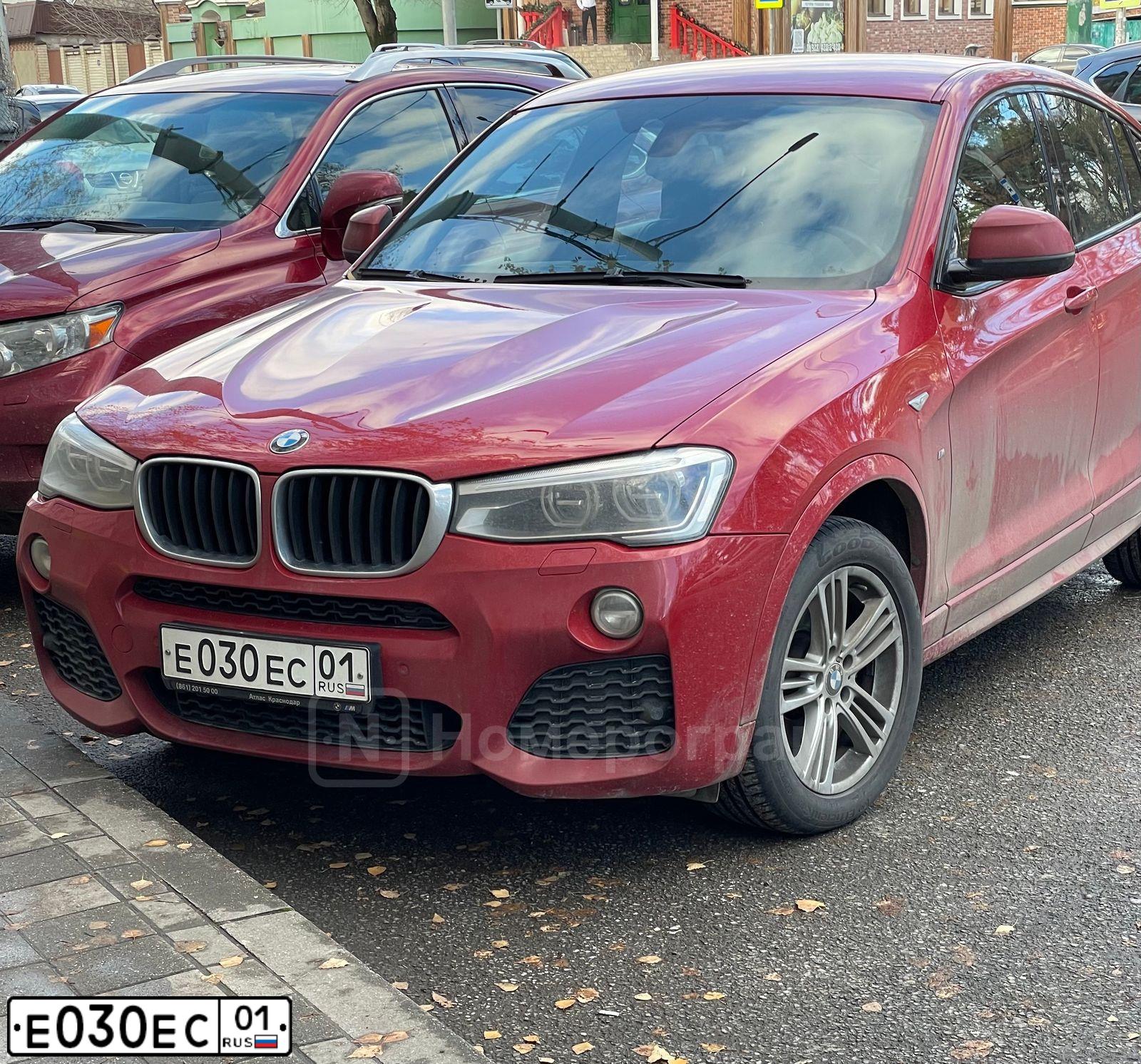 Фото автомобиля BMW X4, 2015 — госномер Е030ЕС01. Цвет: КРАСНЫЙ