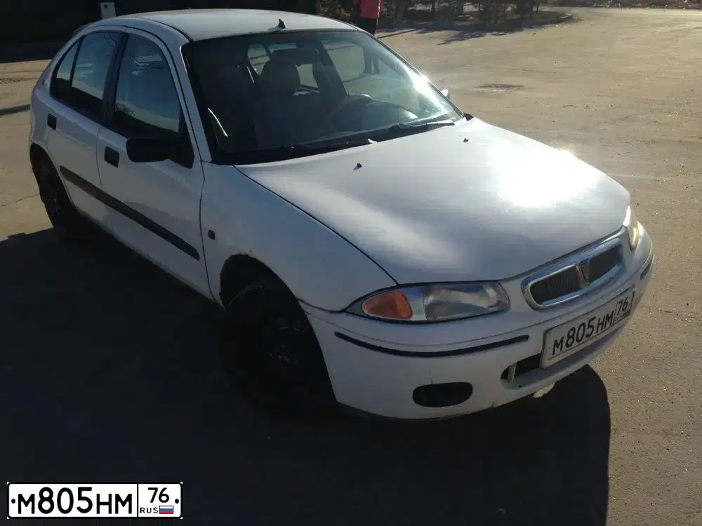 Фото автомобиля РОВЕР 214, 1998 — госномер У424КХ76. Цвет: Белый