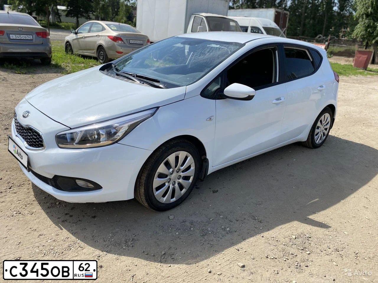 Фото автомобиля KIA CERATO, 2009 — госномер О453УМ62. Цвет: СЕРЫЙ