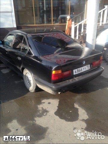 Фото автомобиля BMW W SERIE 5, 1992 — госномер С555ТН64. Цвет: ЧЕРНЫЙ