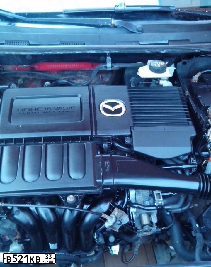 Фото автомобиля MAZDA 3, 2006 — госномер В521КВ33. Цвет: Красный