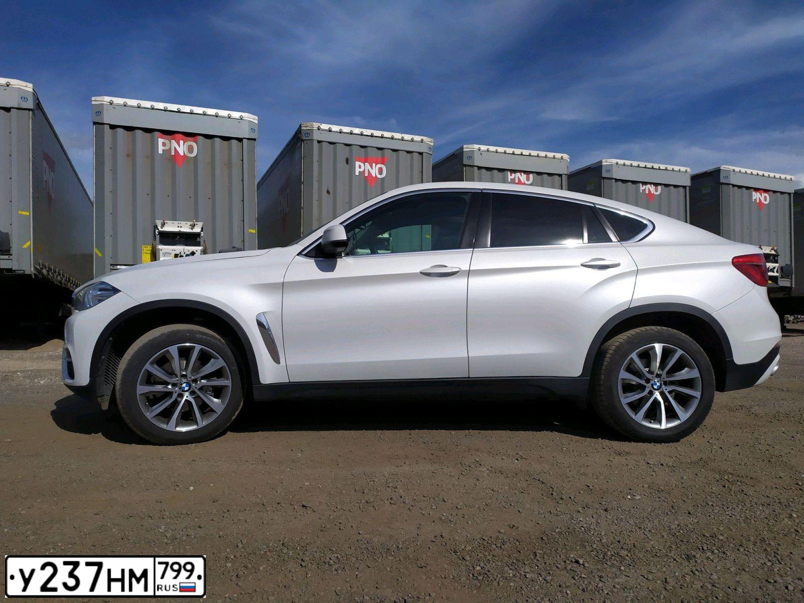 Фото автомобиля BMW X6, 2019 — госномер Т109ВО774. Цвет: БЕЛЫЙ МЕТАЛЛИК