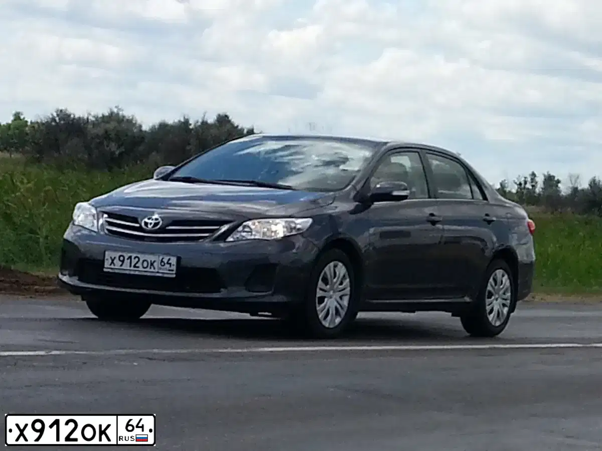 Фото автомобиля TOYOTA COROLLA, 2011 — госномер Н785ТТ68. Цвет: СЕРЫЙ