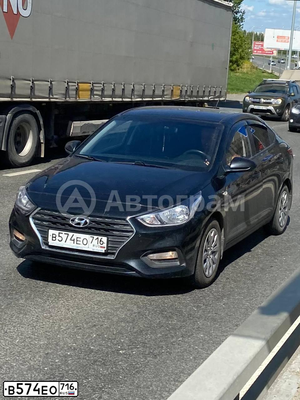 Фото автомобиля HYUNDAI SOLARIS, 2018 — госномер К303ОА716. Цвет: ЧЕРНЫЙ