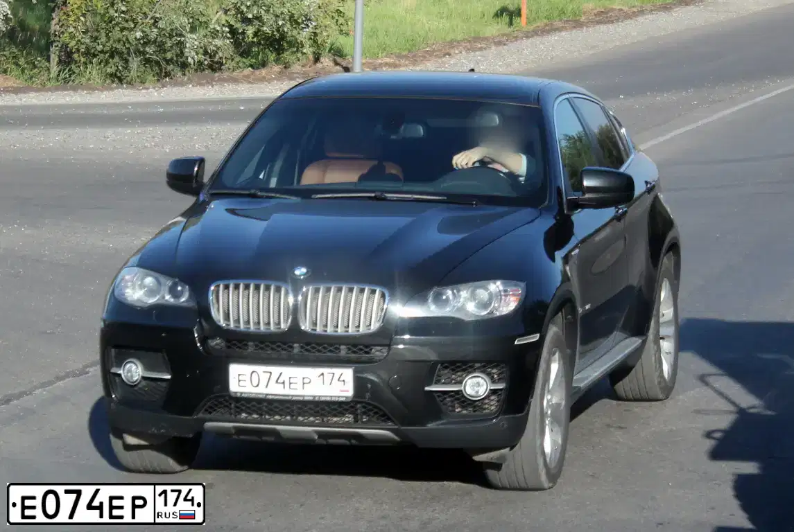 Фото автомобиля BMW X6, 2008 — госномер Е074ЕР174. Цвет: ЧЕРНЫЙ